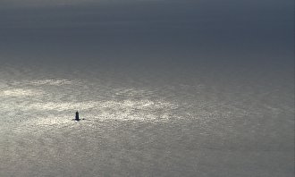 Leuchtturm im Meer Kunstdruck 